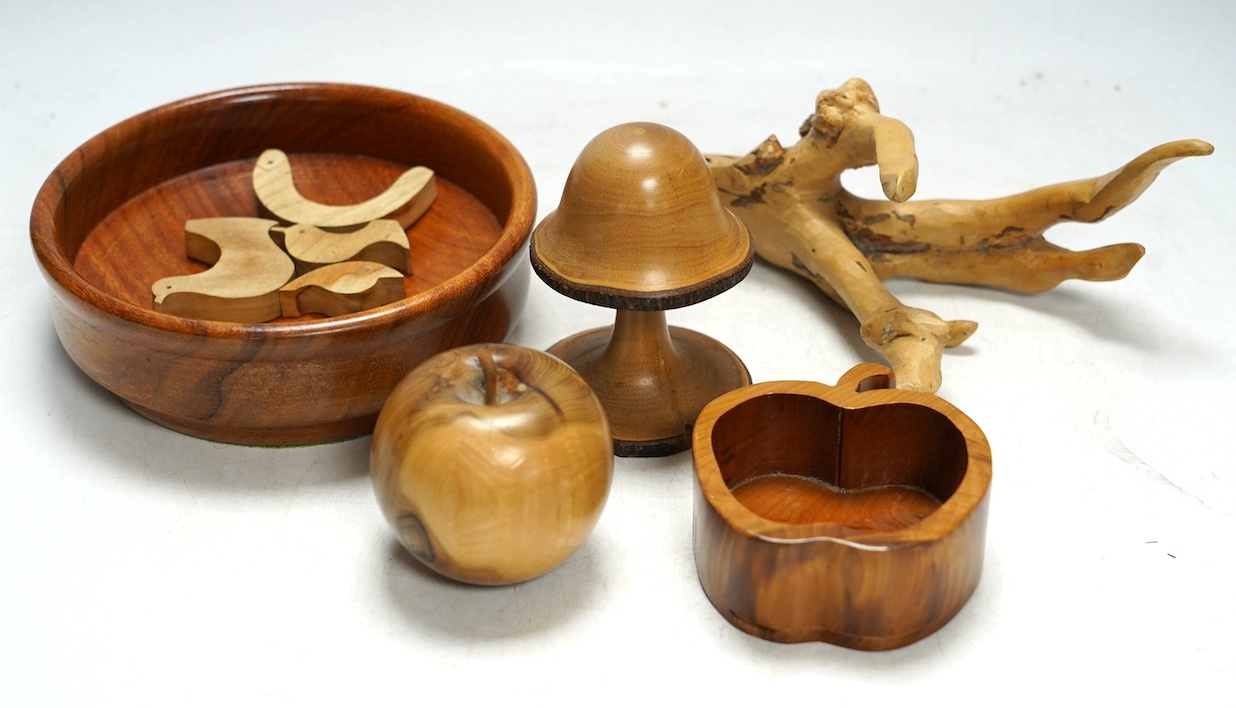 A quantity of modern treen items to include fruit bowl, puzzle and boxes & covers, one in the form of a pear, largest 23cm in diameter. Condition - mostly good